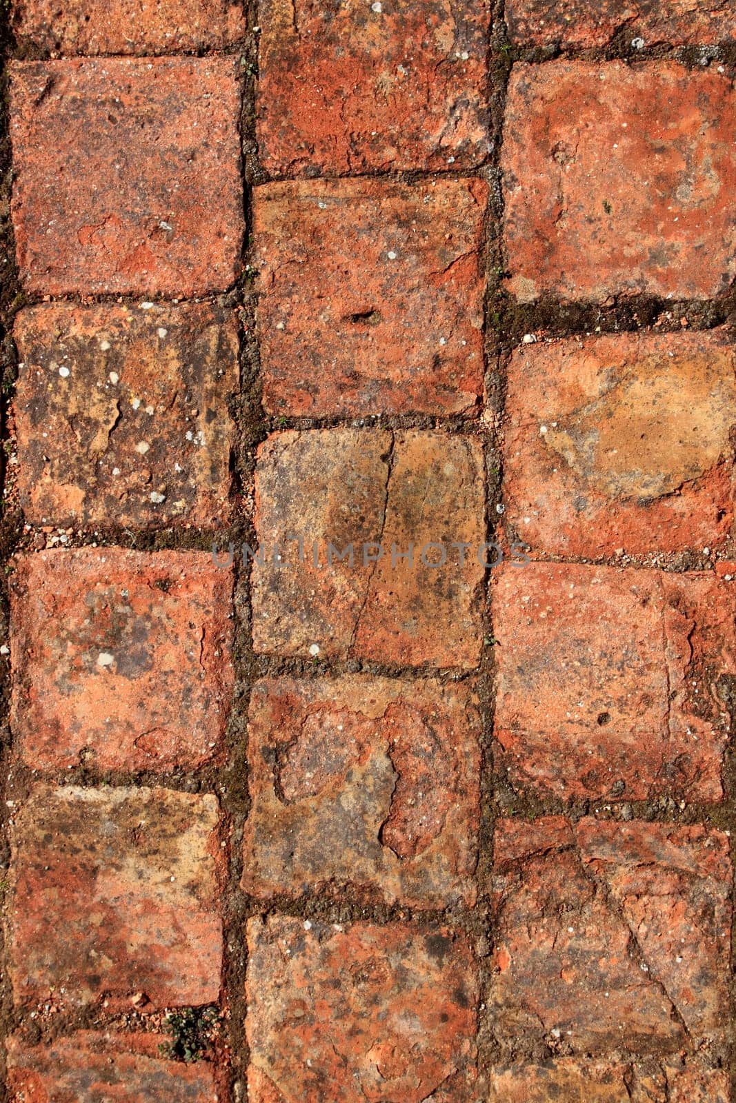 bricks clay soil pavement arrangement traditional Spain closeup