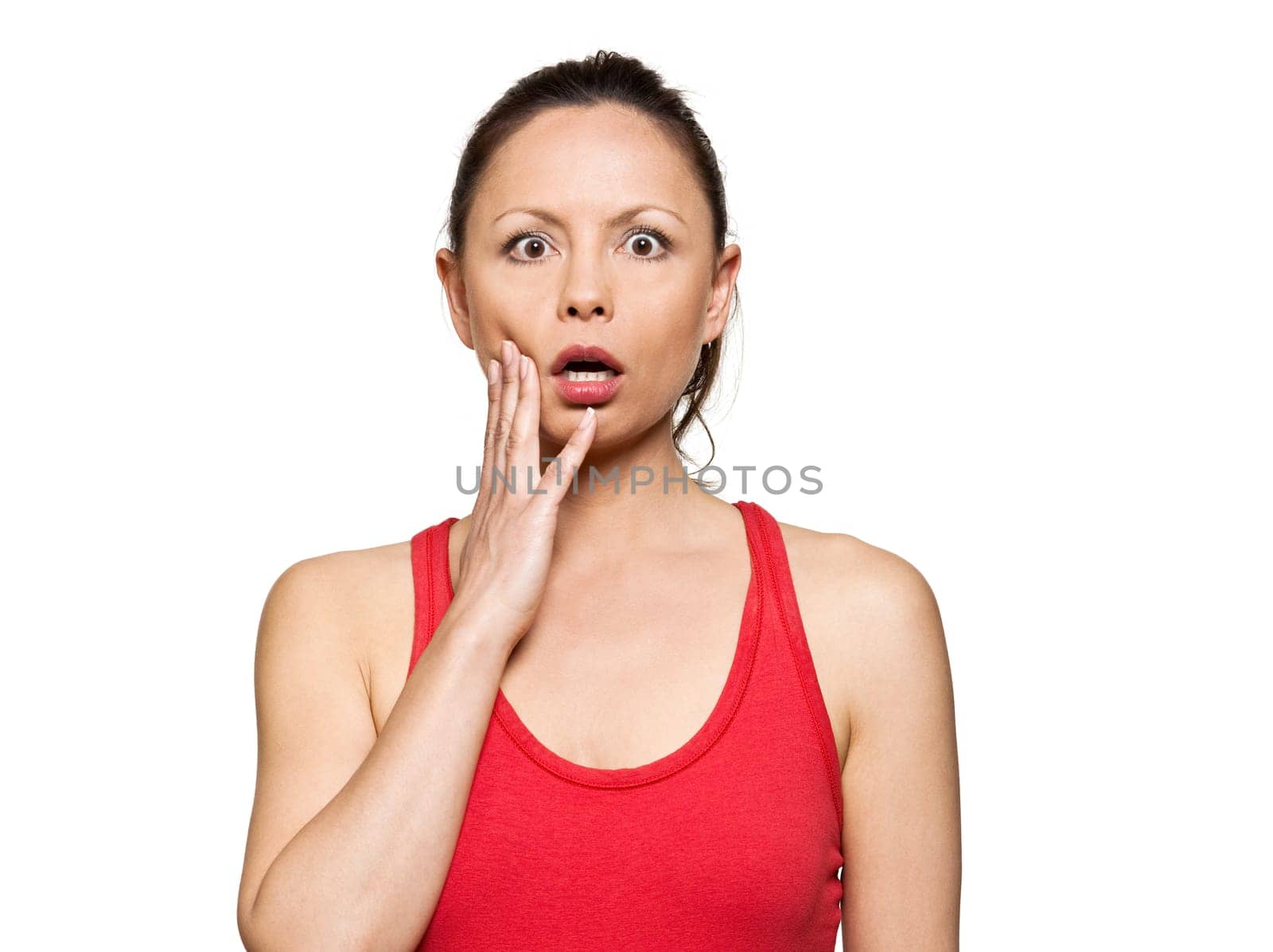 Portrait of expressive surprised woman with eyes wide open in studio isolated on white background