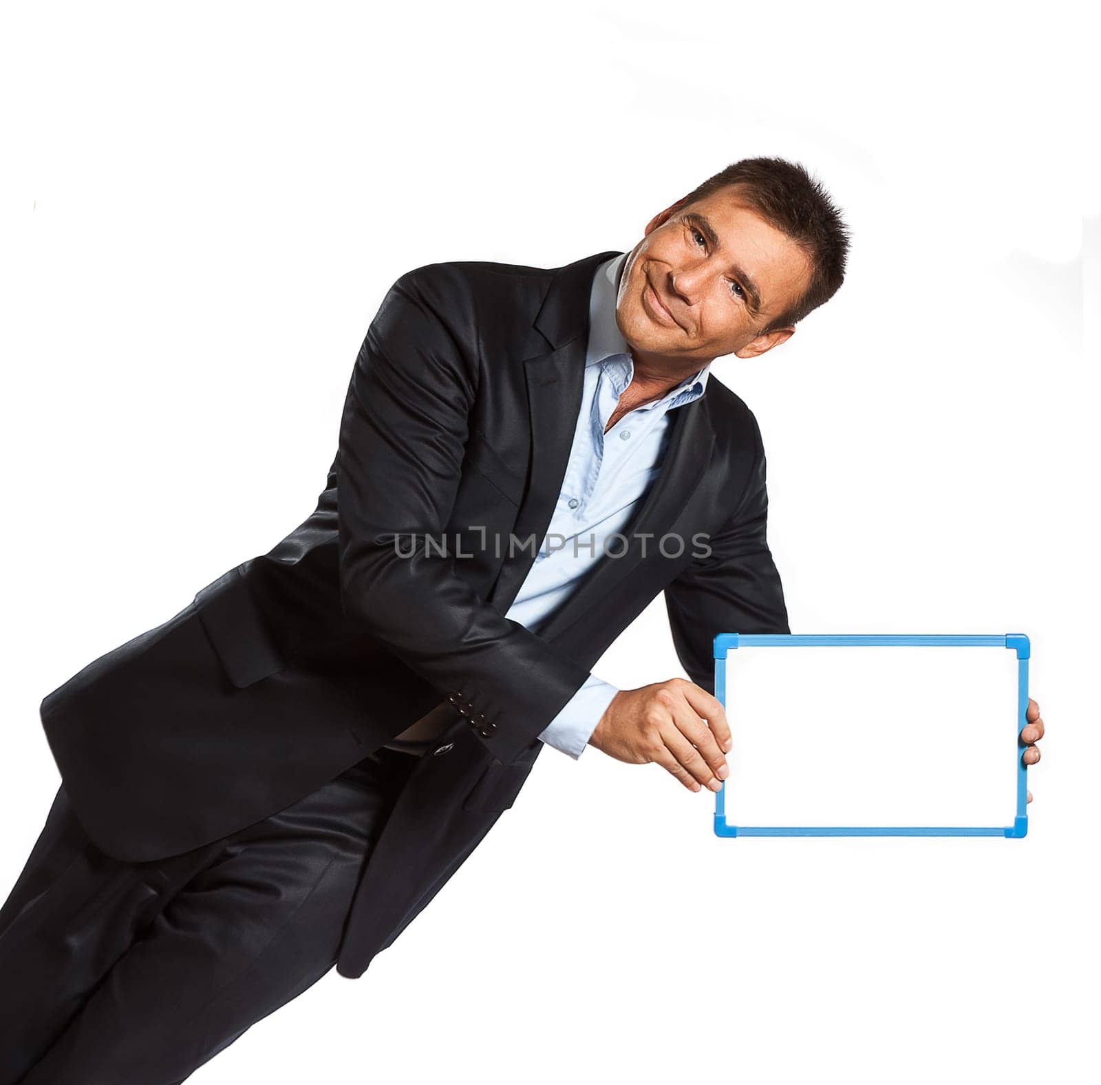 one caucasian business man holding showing whiteboard in studio isolated on white background