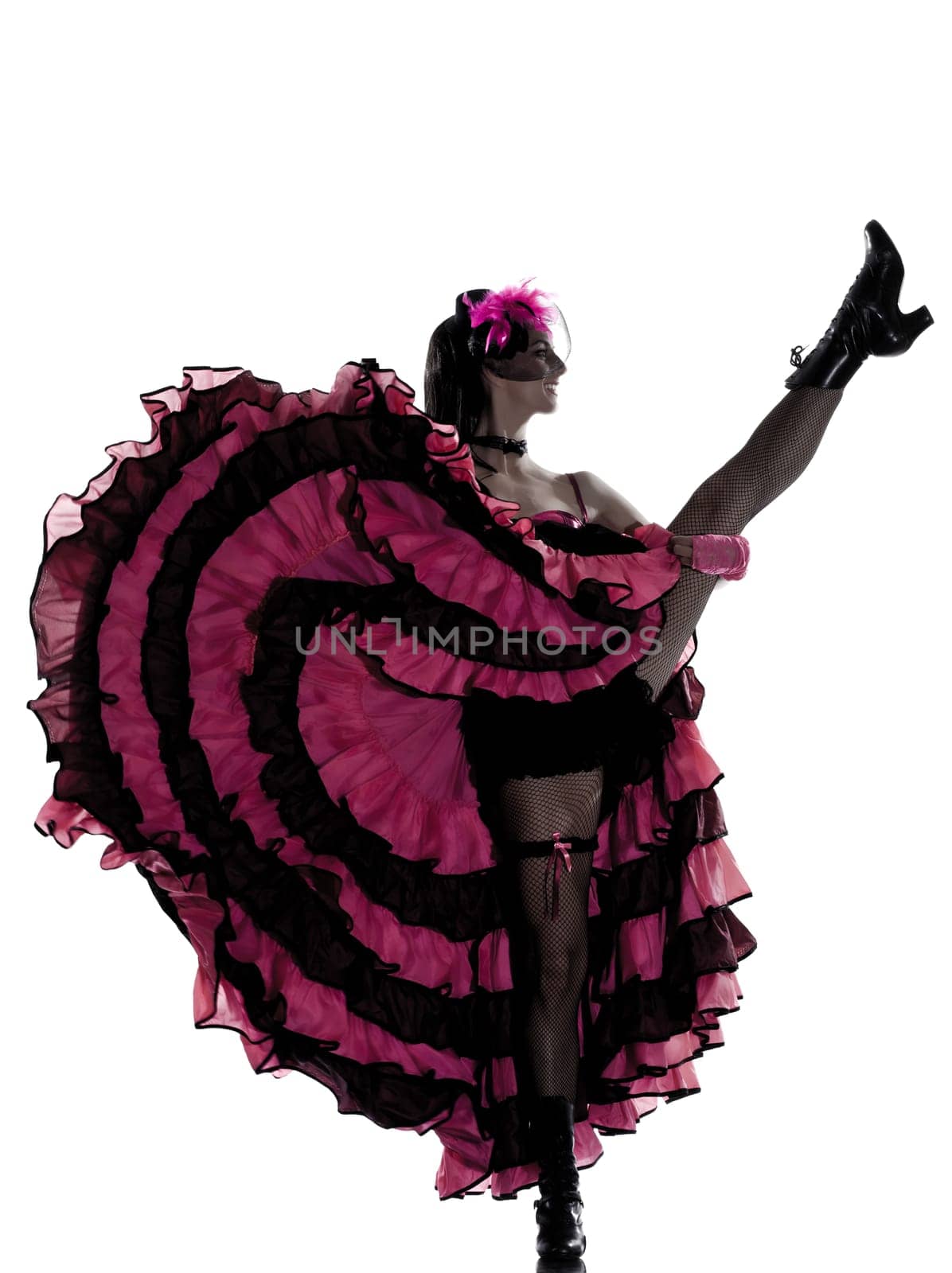 woman dancer dancing french cancan in studio isolated on white background