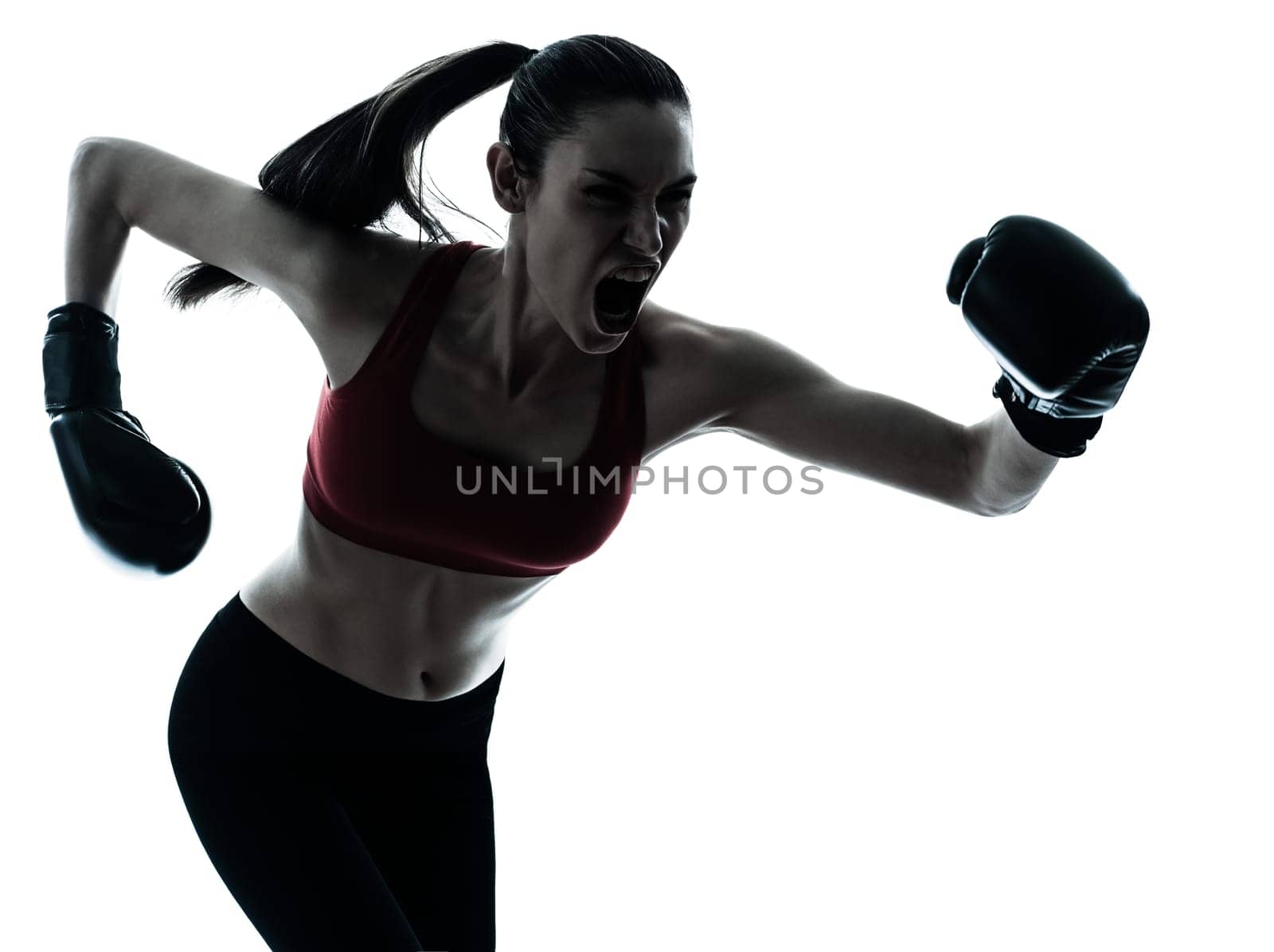 one caucasian woman boxing exercising in silhouette studio isolated isolated on white background