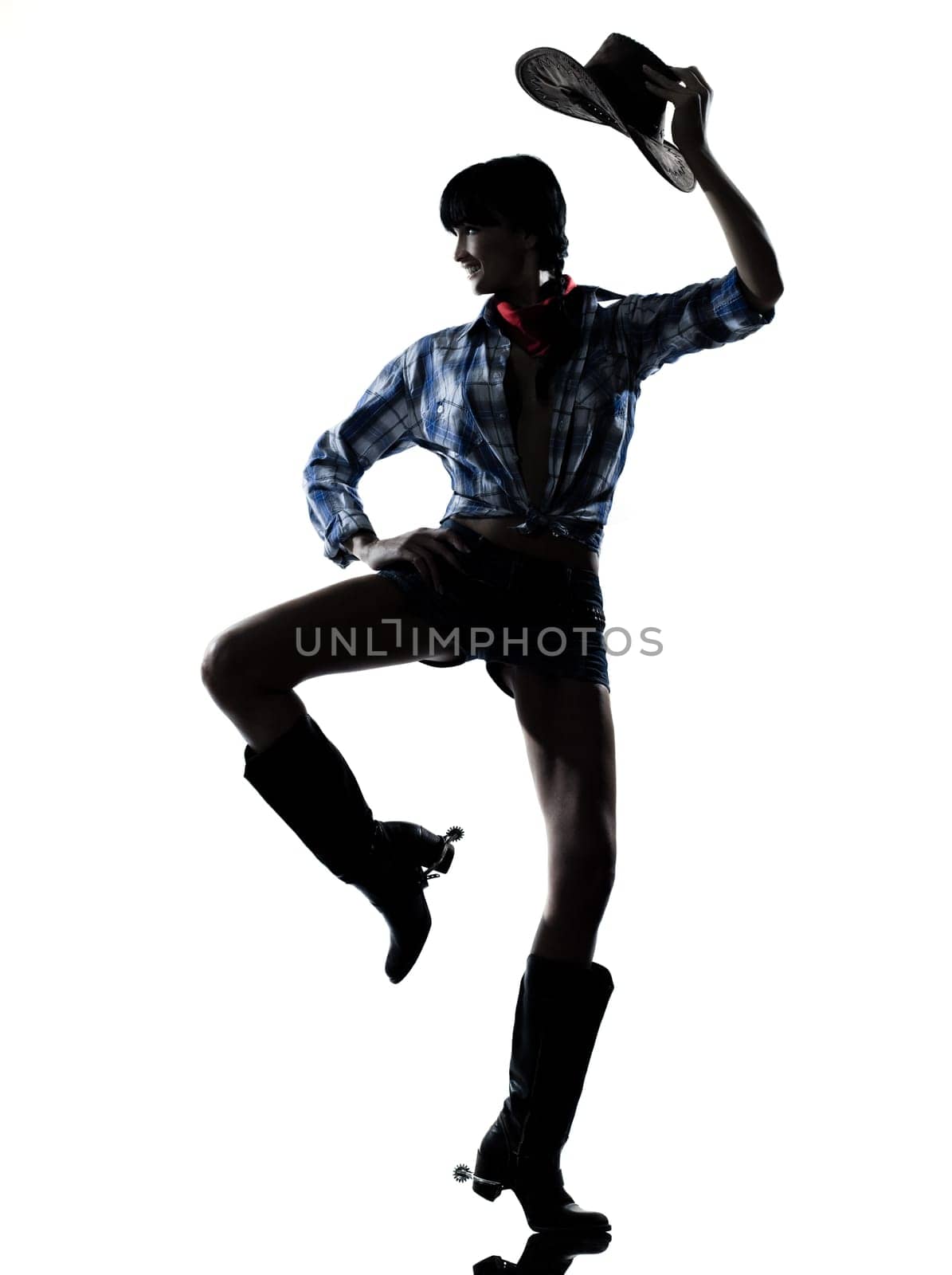 one woman cowgirl  dancer happy dancing country music in studio isolated on white background