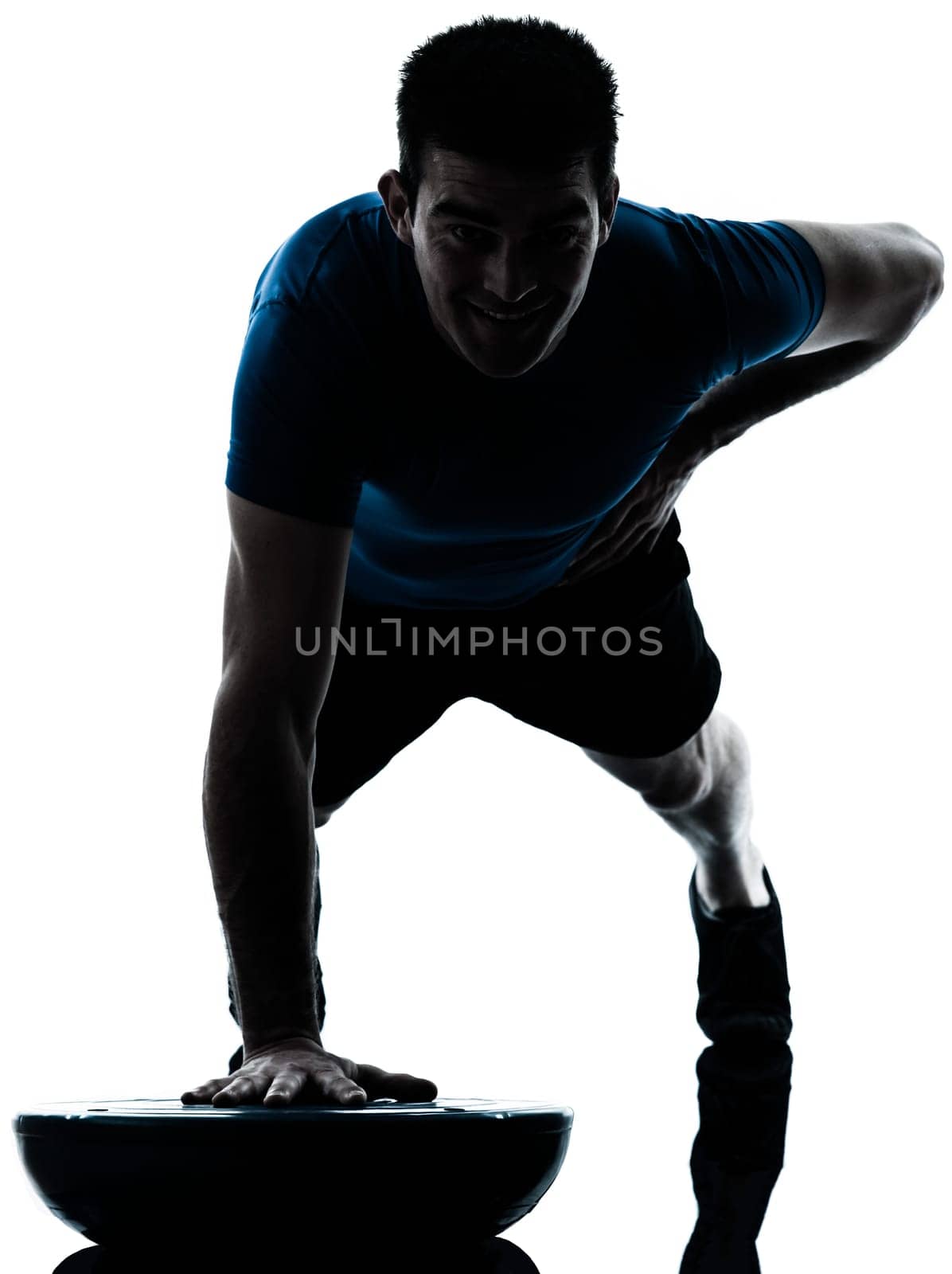 one caucasian man exercising push ups on bosu workout fitness in silhouette studio  isolated on white background