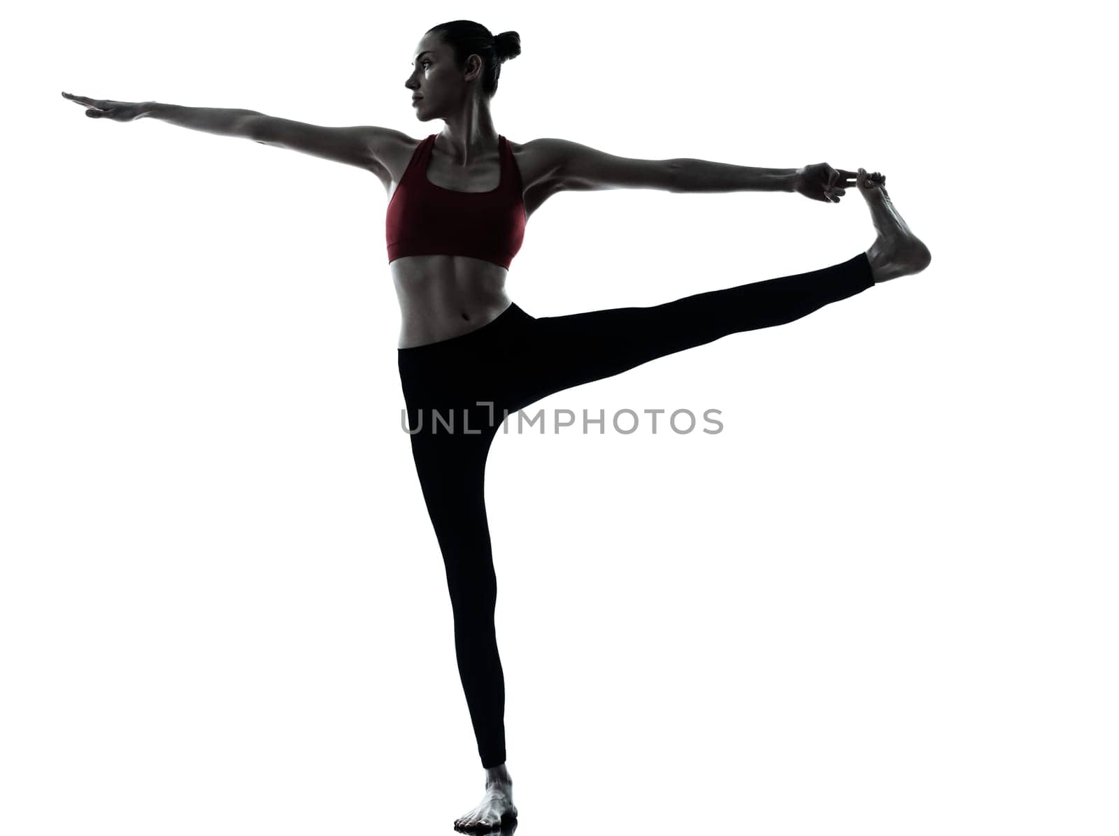 one caucasian woman exercising yoga  Revolved Hand to Big Toe Pose in silhouette studio isolated on white background