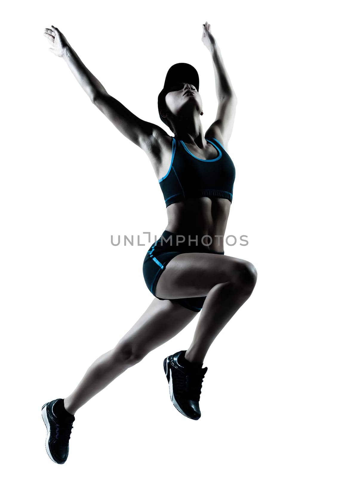 one caucasian woman runner jogger jumping in silhouette studio isolated on white background