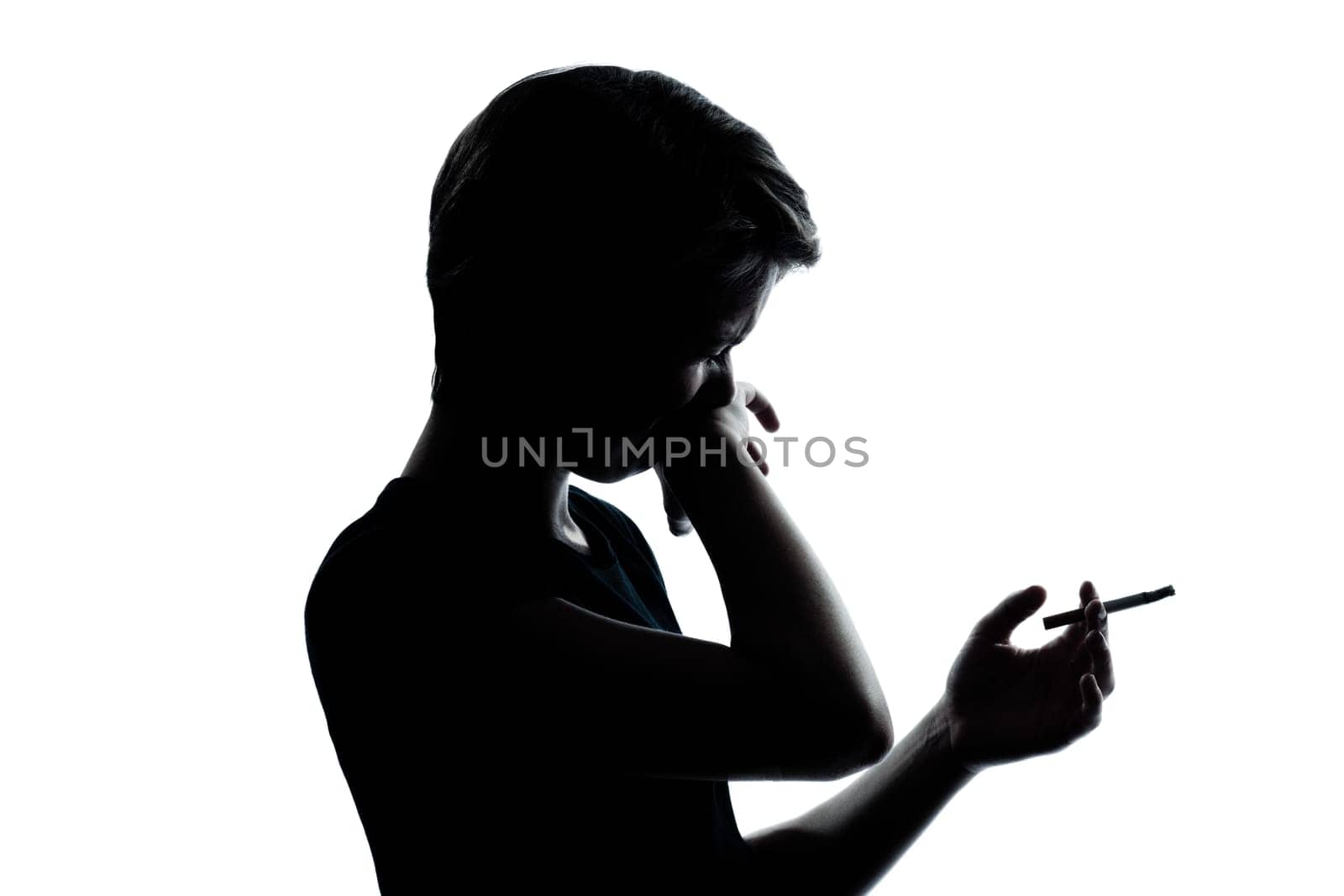 one caucasian young teenager silhouette boy or girl portrait in studio cut out isolated on white background