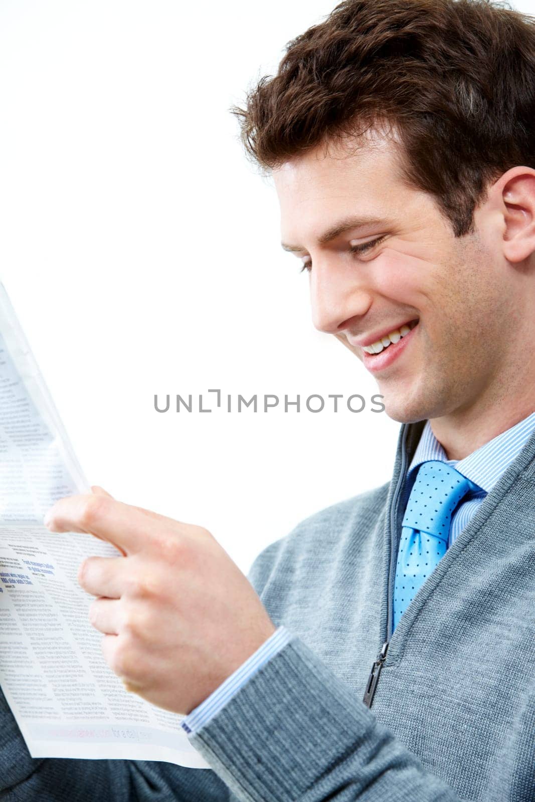 Photo of handsome man reading paper over white background