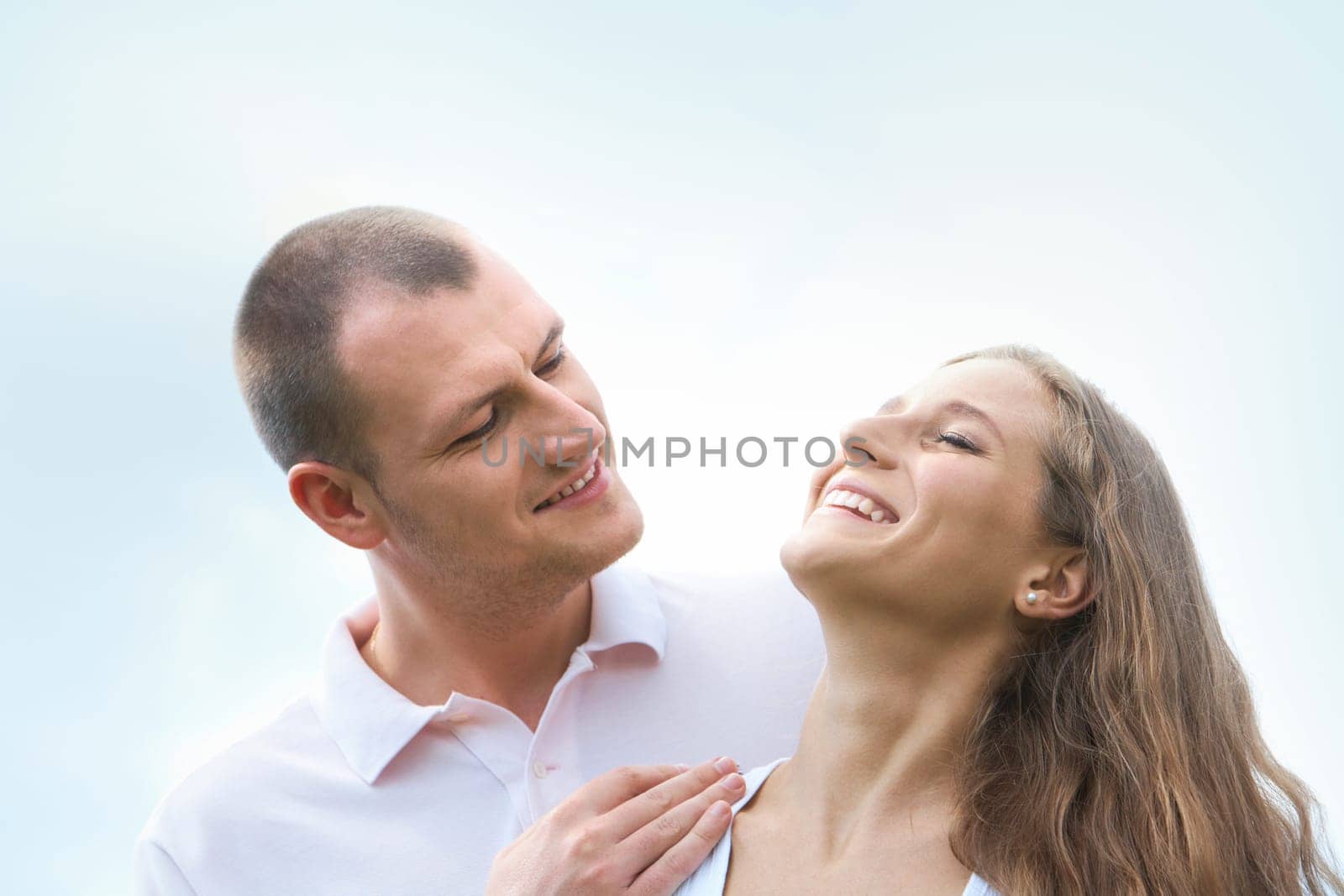 Happy man looking at content female outdoors