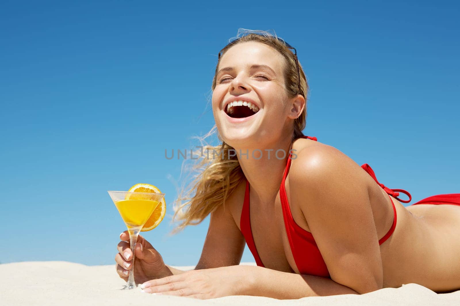 Portrait of charming woman screaming and holding cocktail