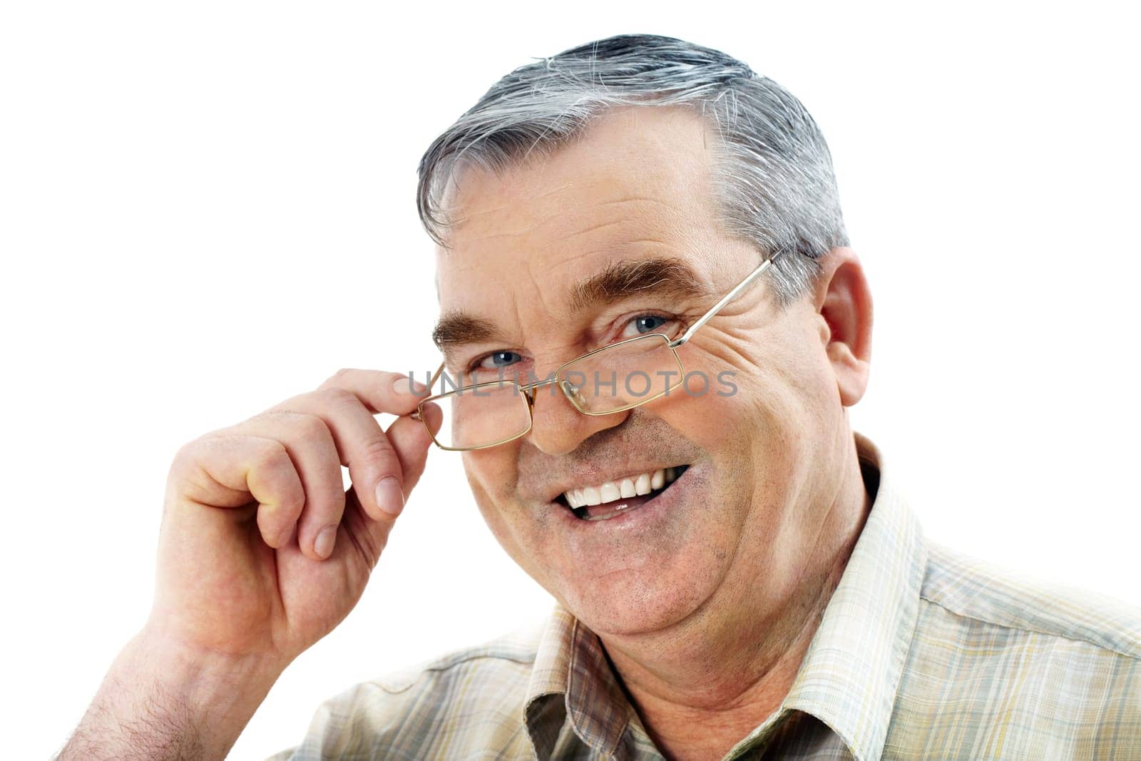 Portrait of an elderly man looking at camera and smiling