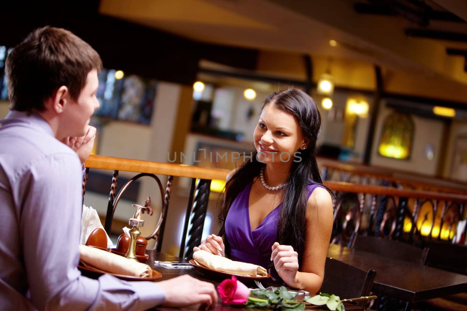 Portrait of happy couple having launch