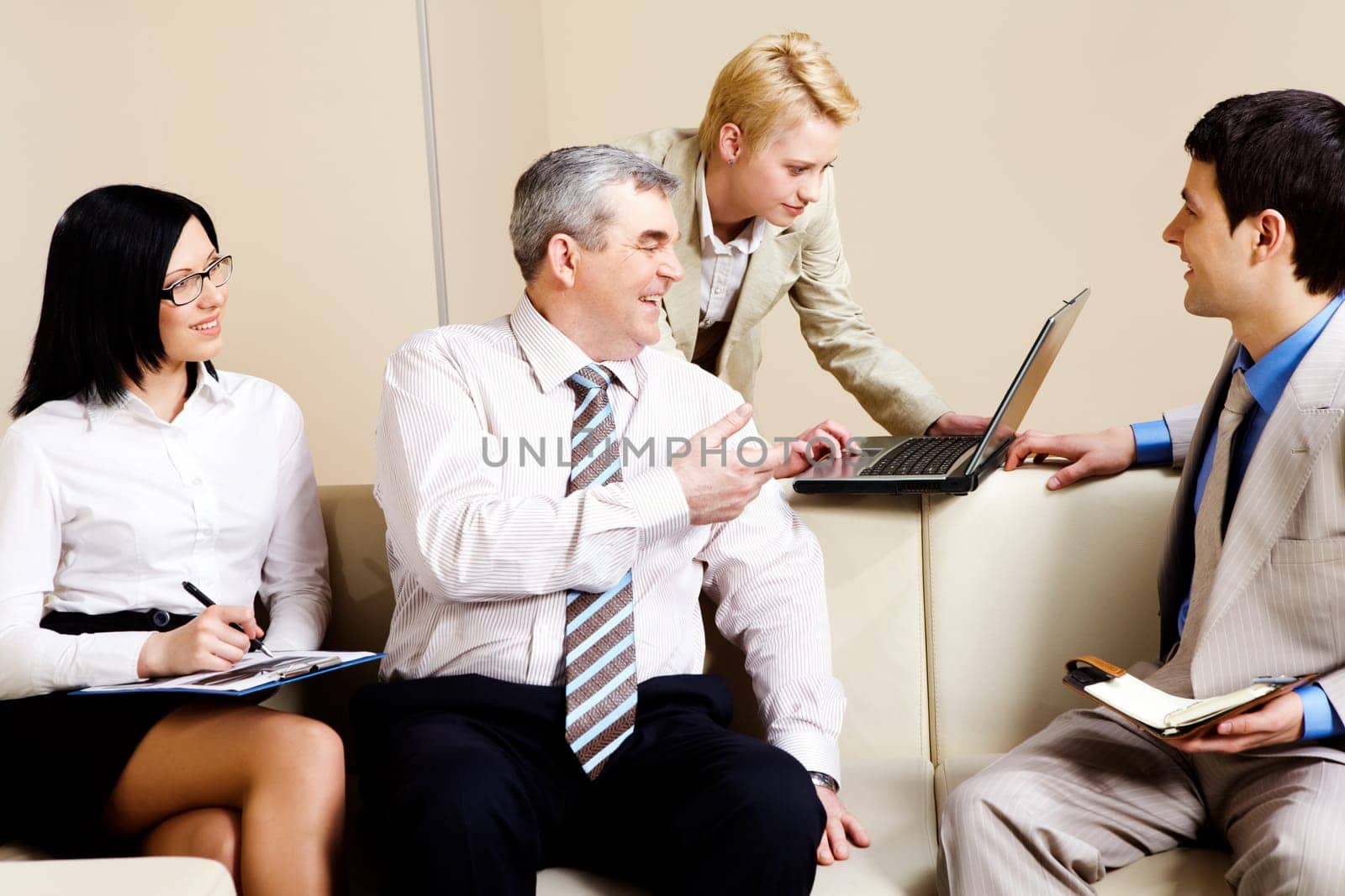 Portrait of business partners communicating in office