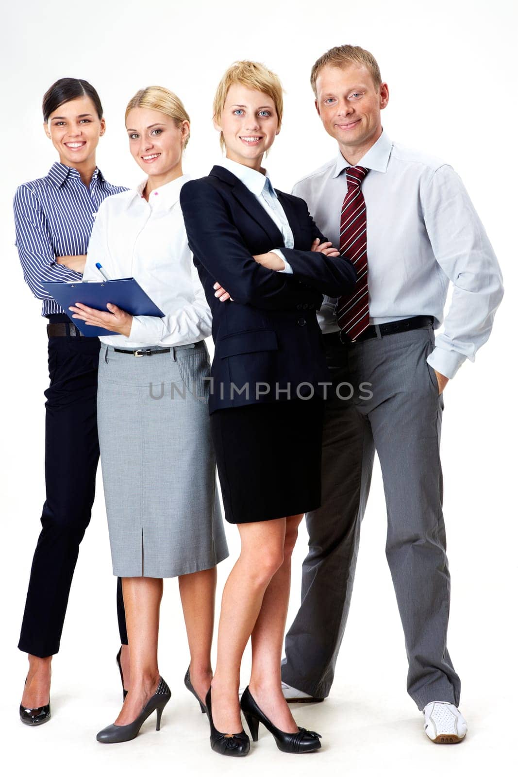Portrait of friendly business team standing in isolation
