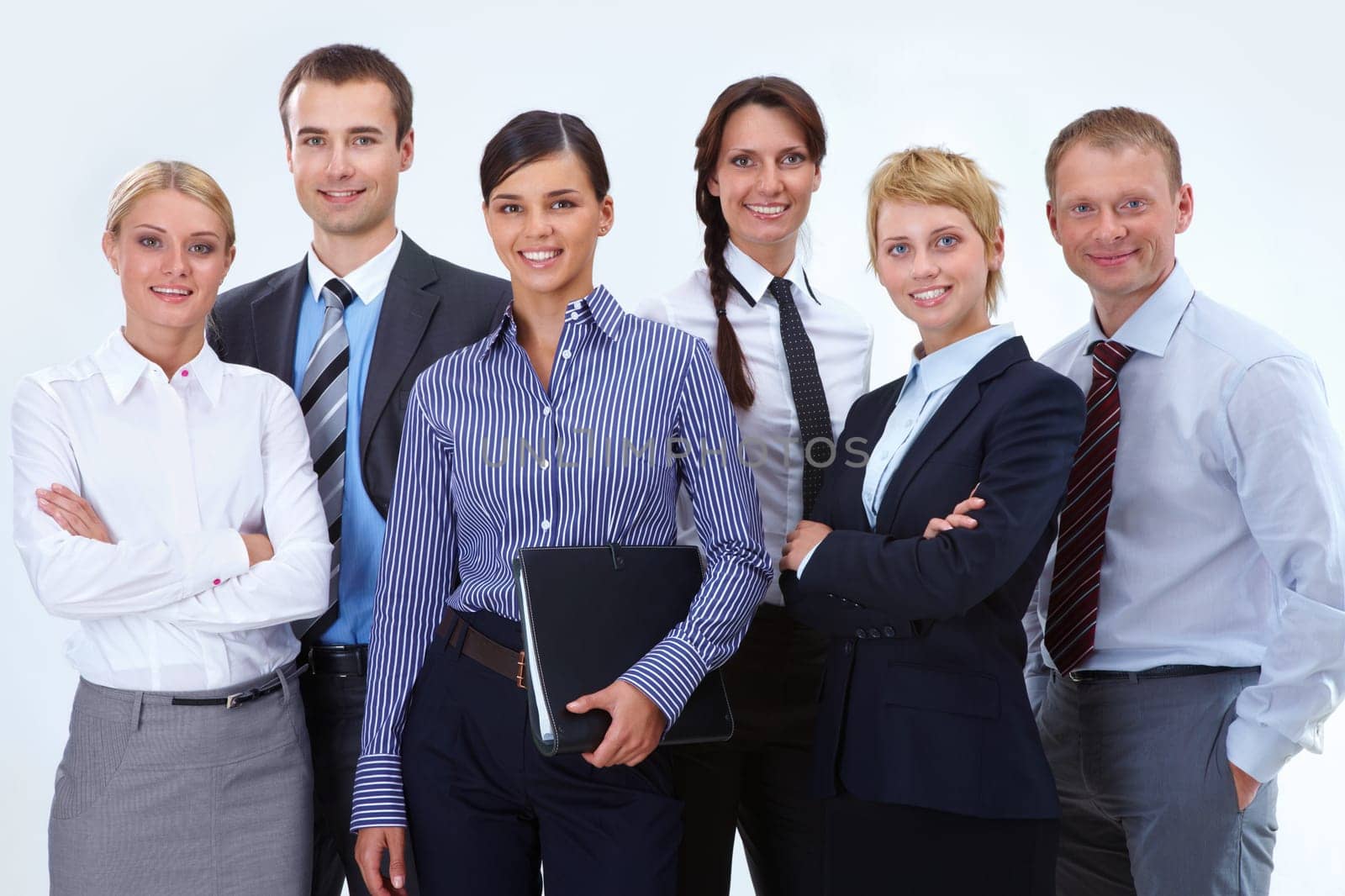 Portrait of friendly business team posing in front of camera
