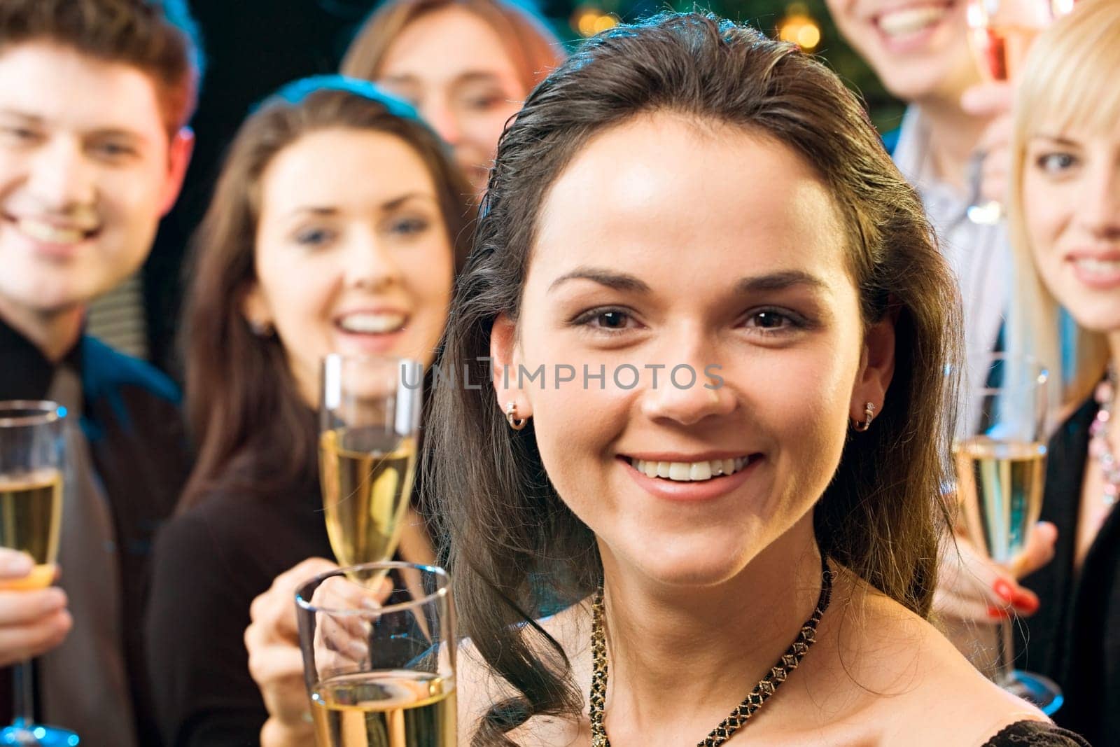 Face of beautiful woman with wonderful smile at a party
