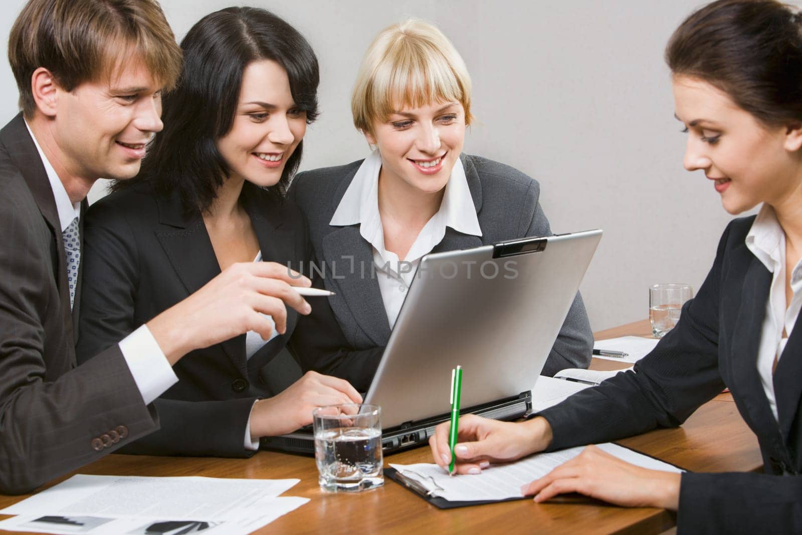 Contemporary business people working together in the office