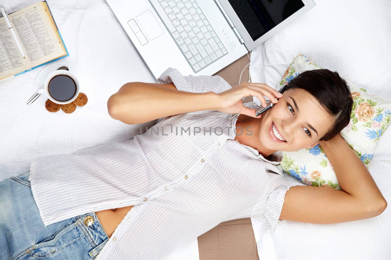 Portrait of a young girl speaking on cellphone