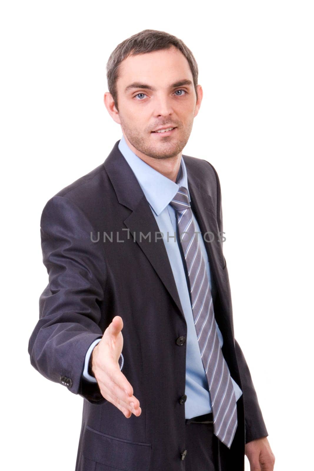 A man extending his hand to the business partner with a smile