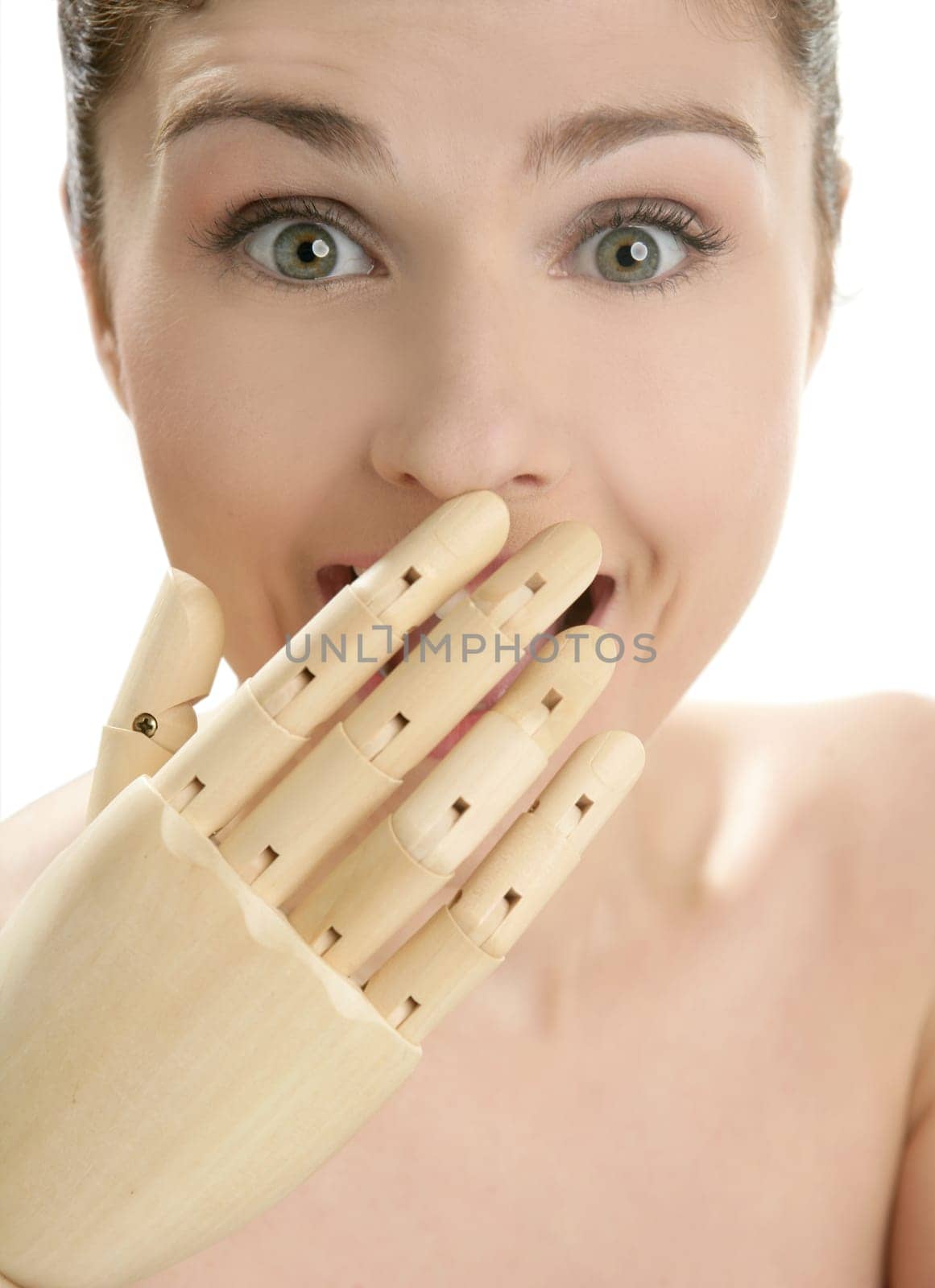 woman portrait smiling surprised with mannequin hand