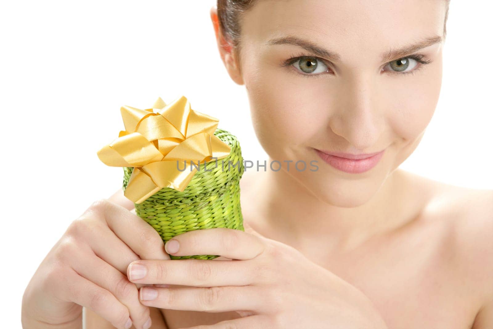 Beautiful woman portrait with a green present gift