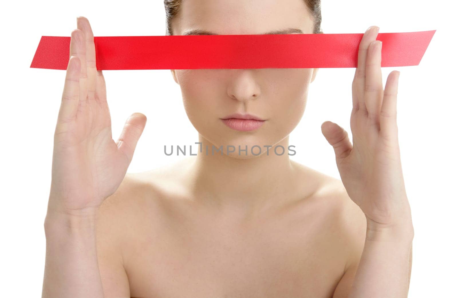 Beautiful cosmetic woman clean portrait, with red tape in eyes