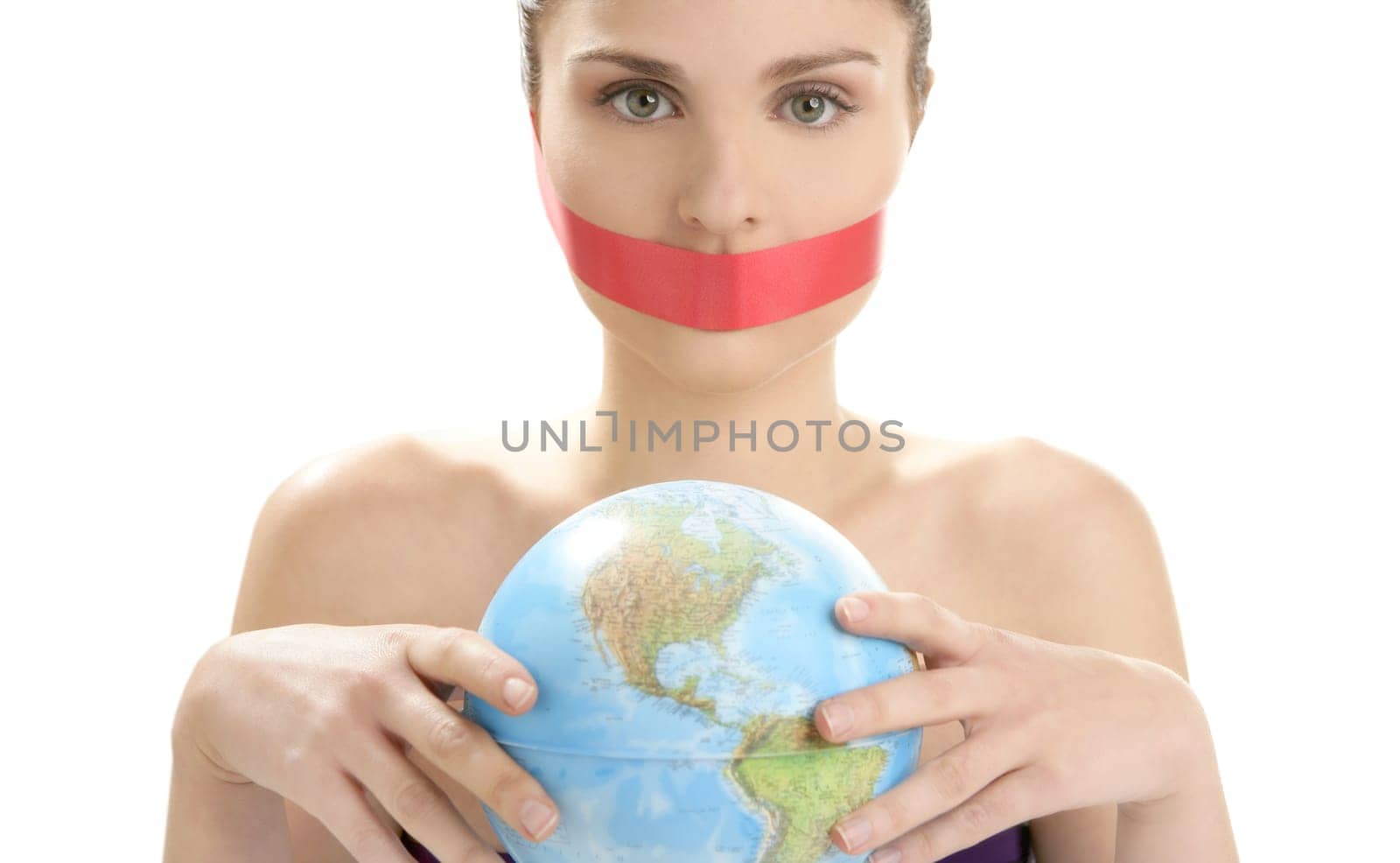 Beautiful woman with red tape on mouth portrait isolated on white