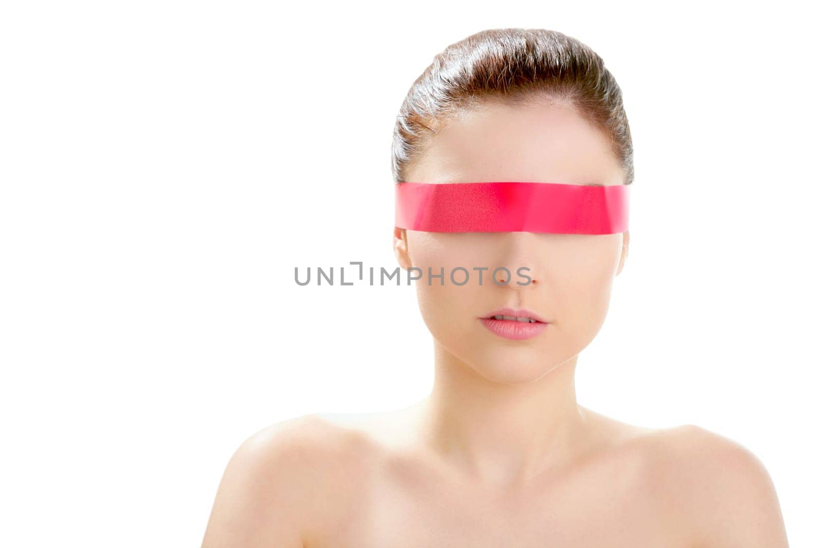 Beautiful cosmetic woman clean portrait, with red tape in eyes