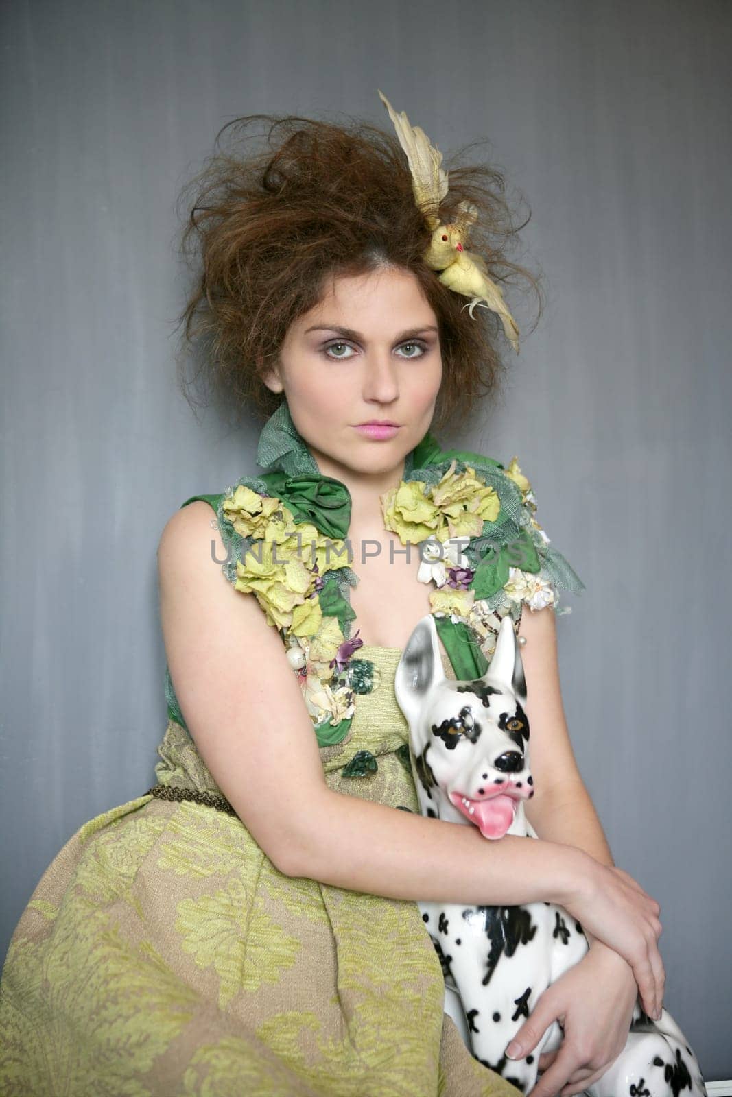 portrait of vanguard modern fashion woman with dalmatian dog