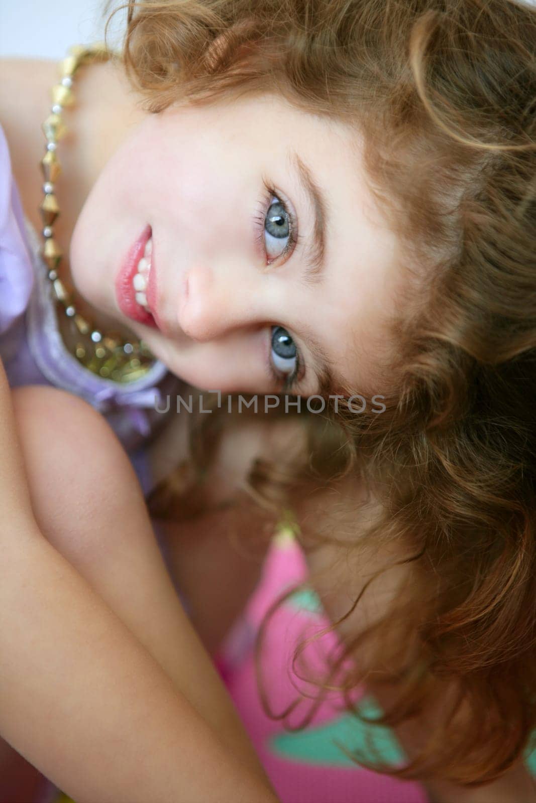Beautiful little blue eyes preschooler girl smiling to camera
