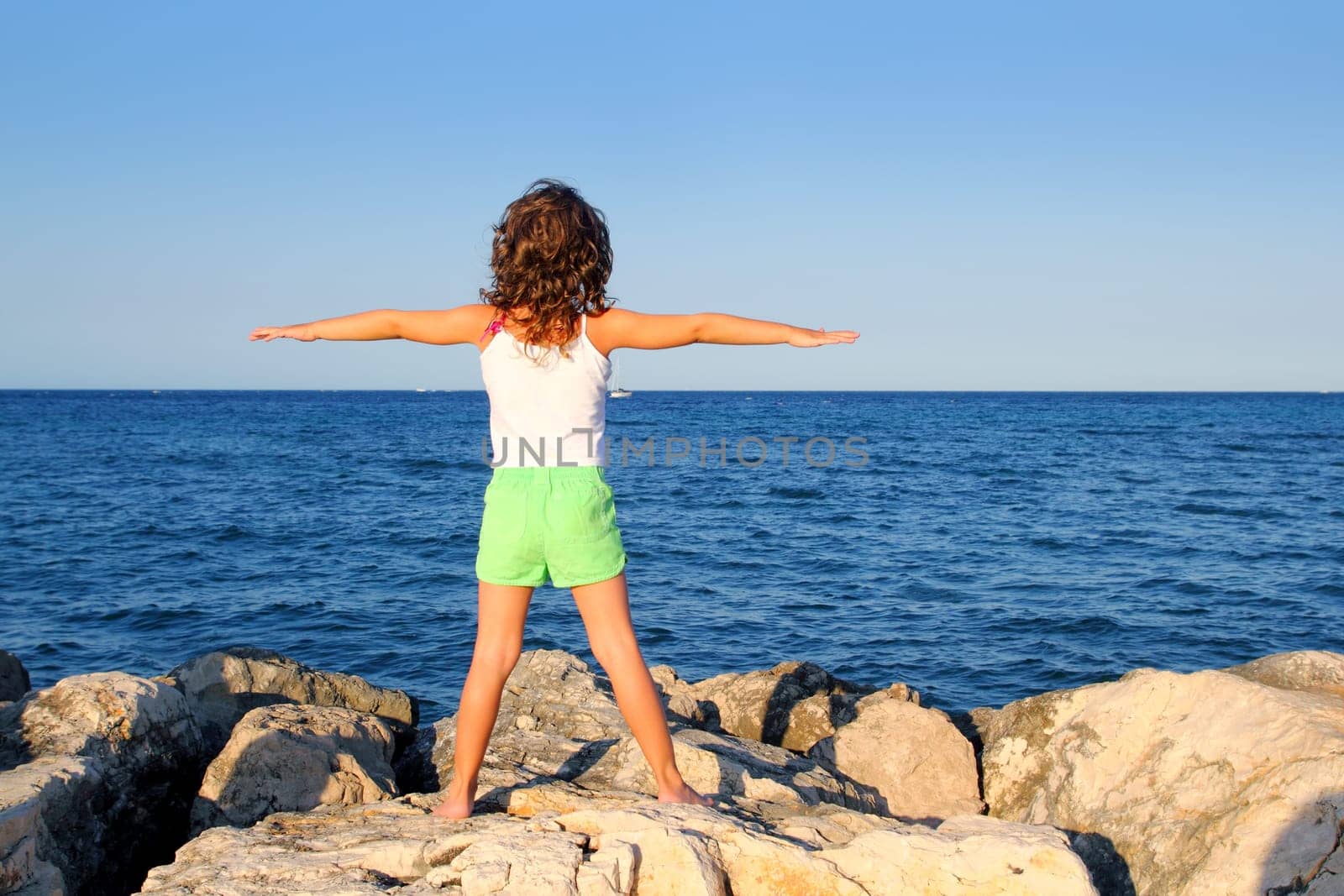 open arms girl looking blue ocean sea feeling freedom in vacation