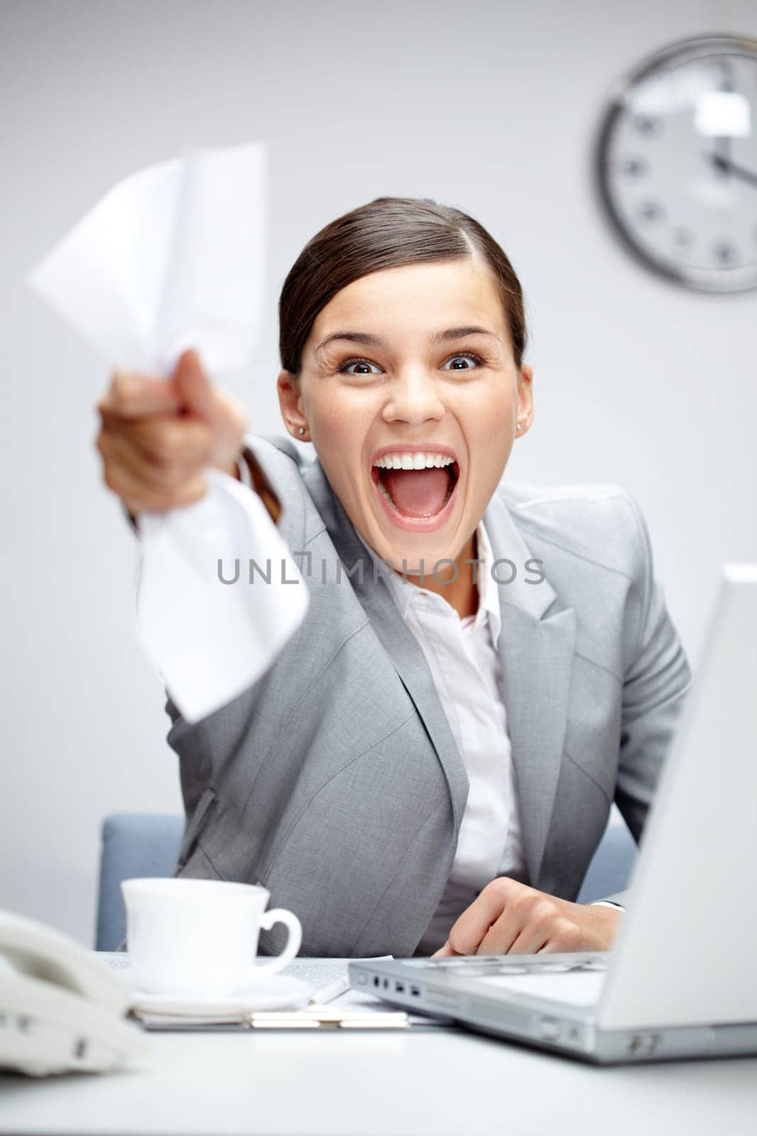Image of young businesswoman shouting in luck