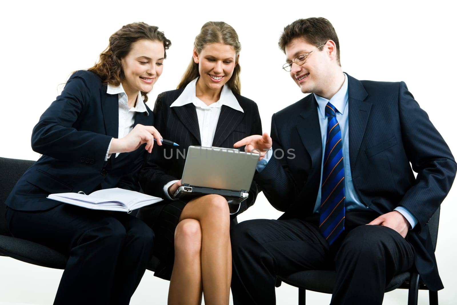 Image of three business people sitting on the chairs and discussing