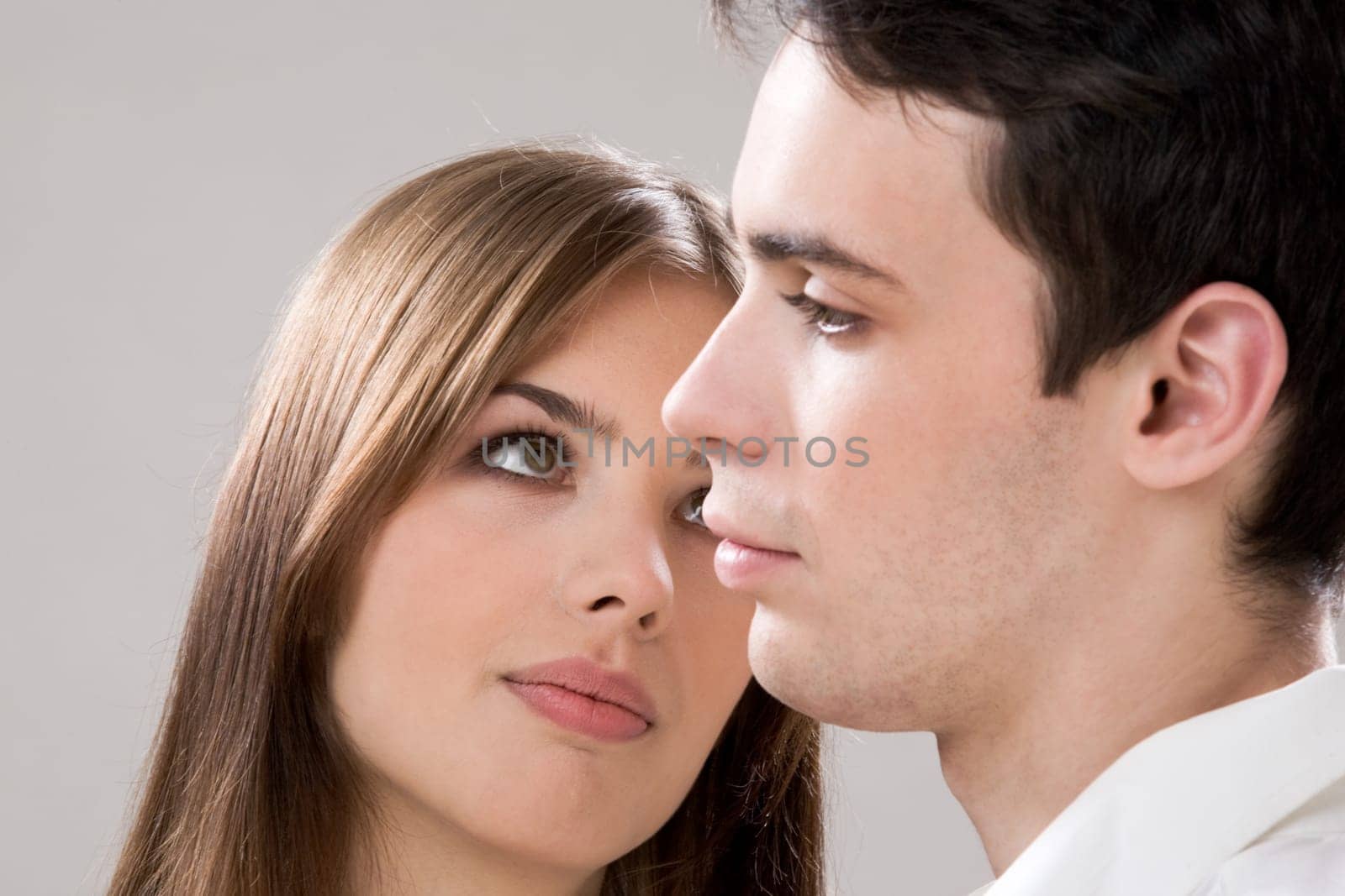 Photo of pretty girl looking at handsome guy with admiration