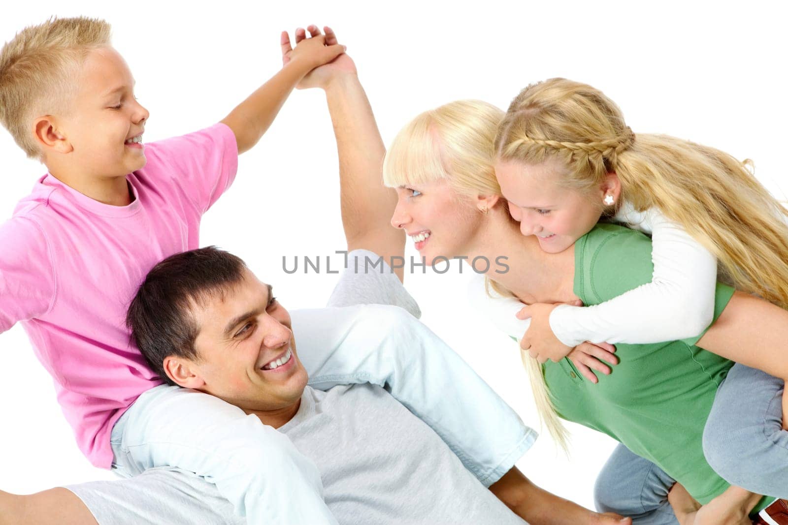 Portrait of parents doing piggyback to their children