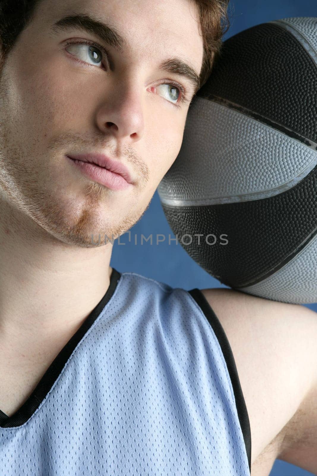 basketball basket ball real player portrait over grunge blue