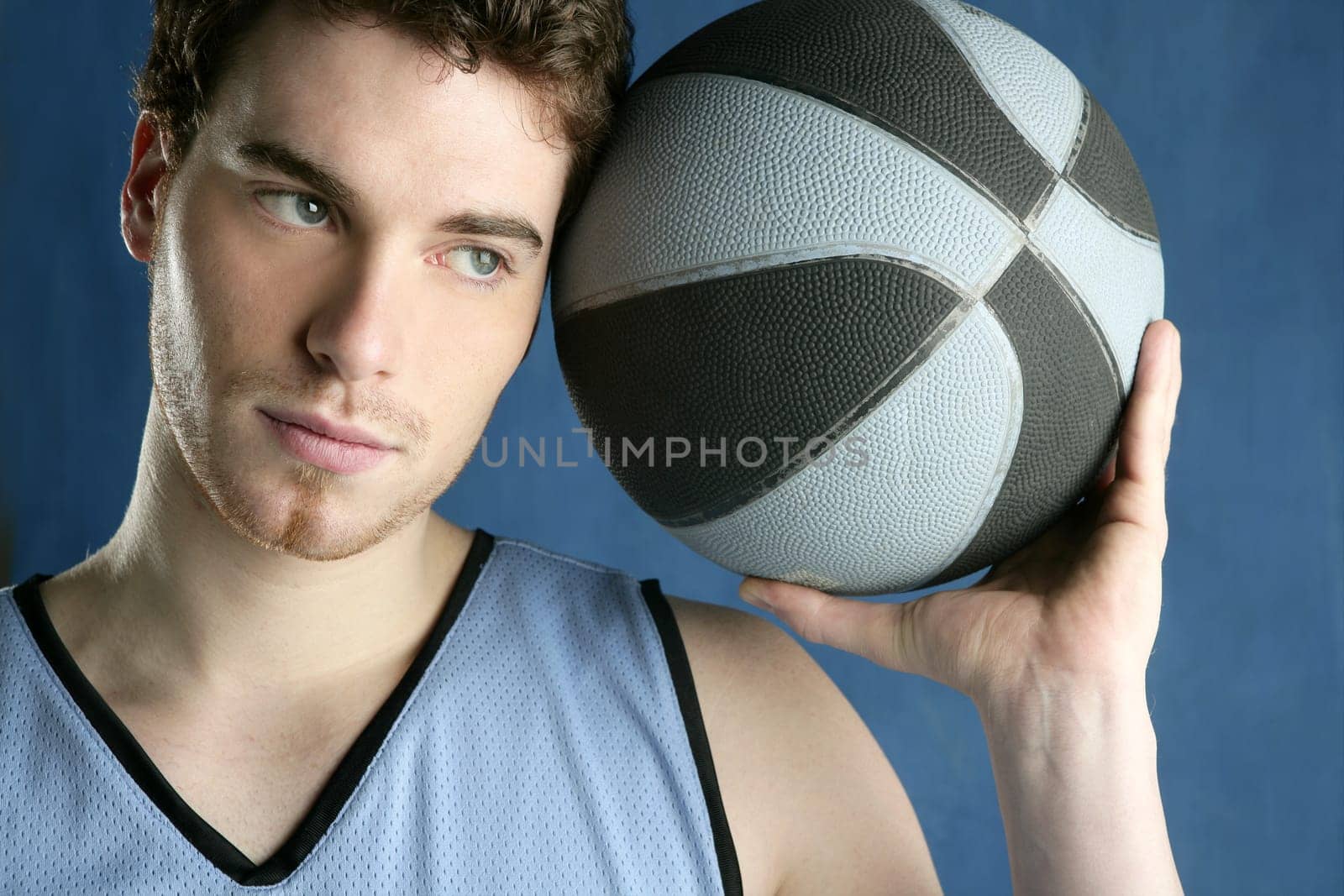 basketball basket ball real player portrait over grunge blue