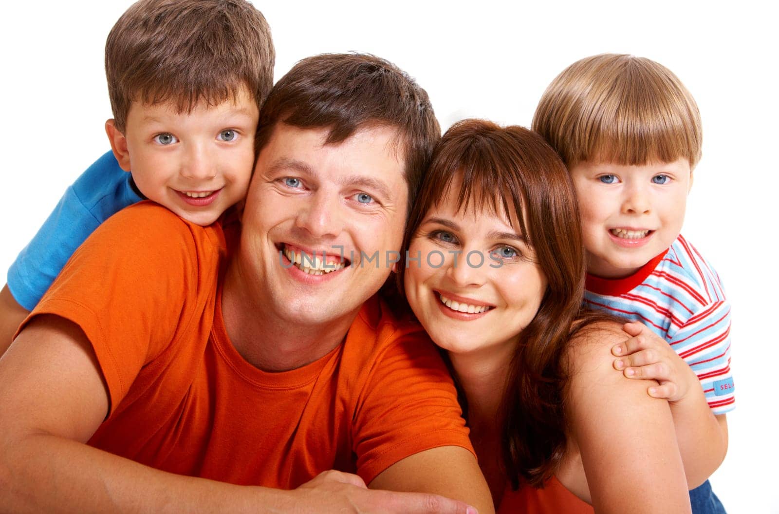 Portrait of joyful family laughing and looking at camera on white background