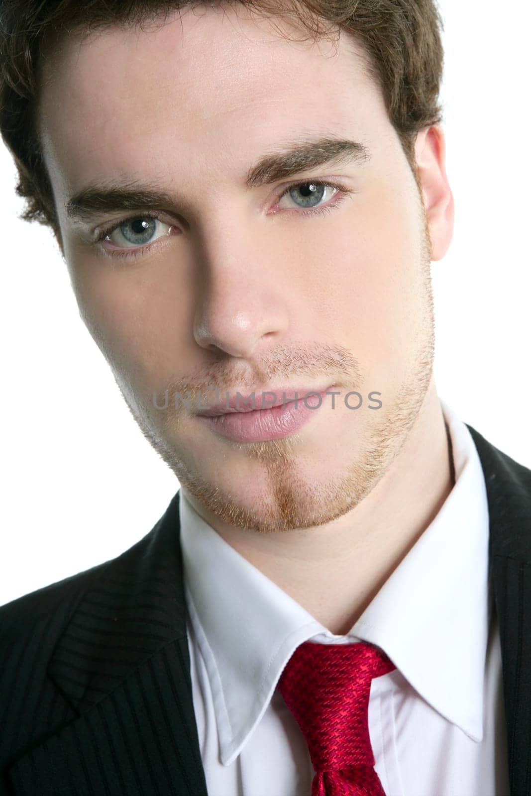 handsome young businessman portrait tie suit white background