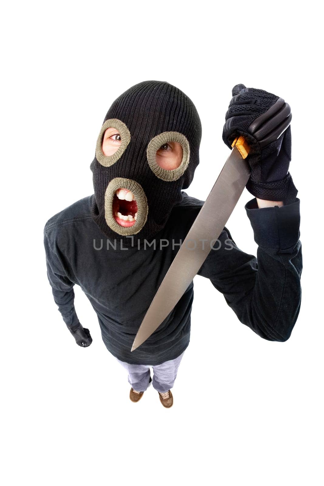 Fish-eye shot of a criminal in mask holding knife