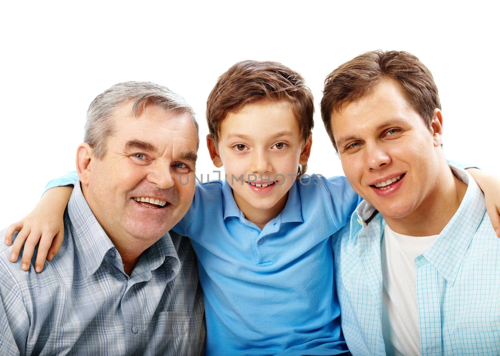 Portrait of a father, grandfather and son embracing