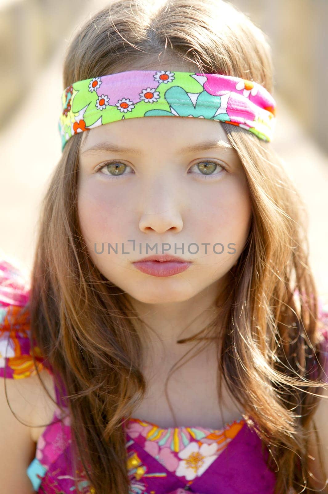 Portrait of beautiful teen girl outdoors in summertime