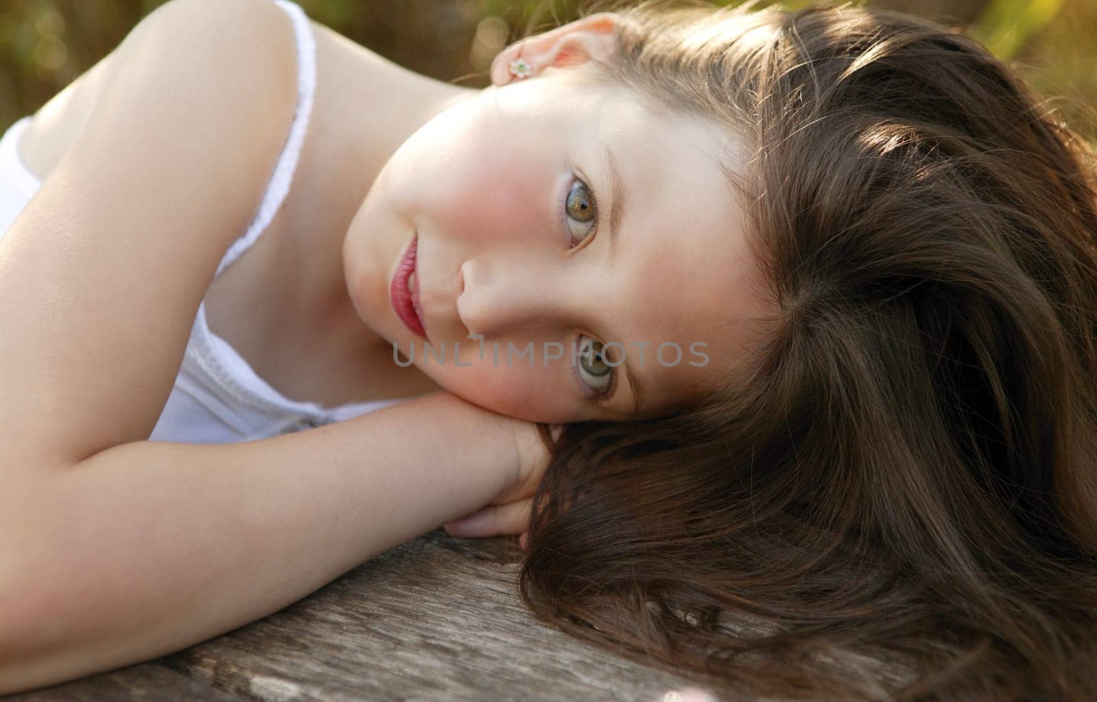 Portrait of beautiful teen girl outdoors in summertime