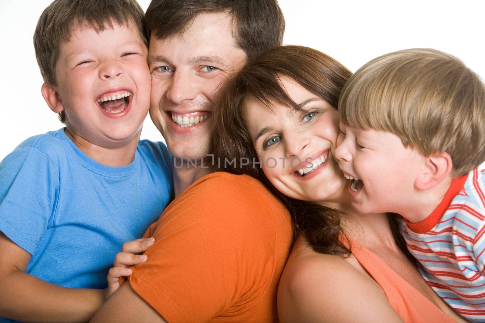 Portrait of laughing family members having a good time together