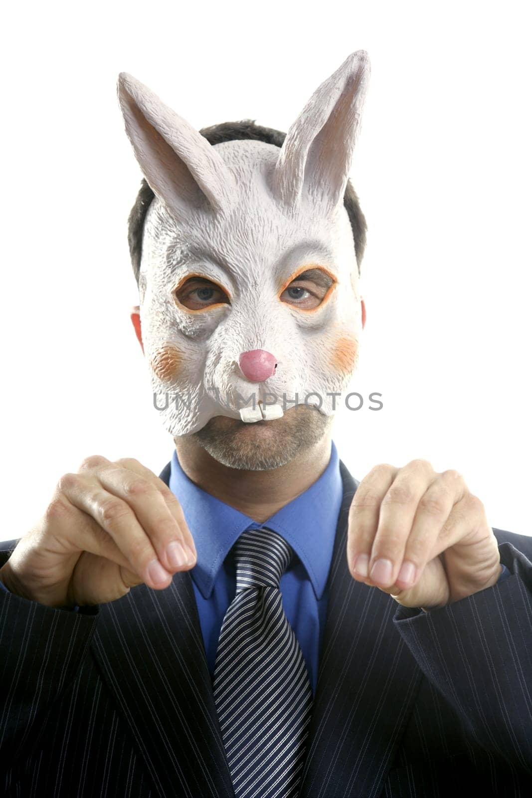 Businessman with funny rabbit mask over white studio background