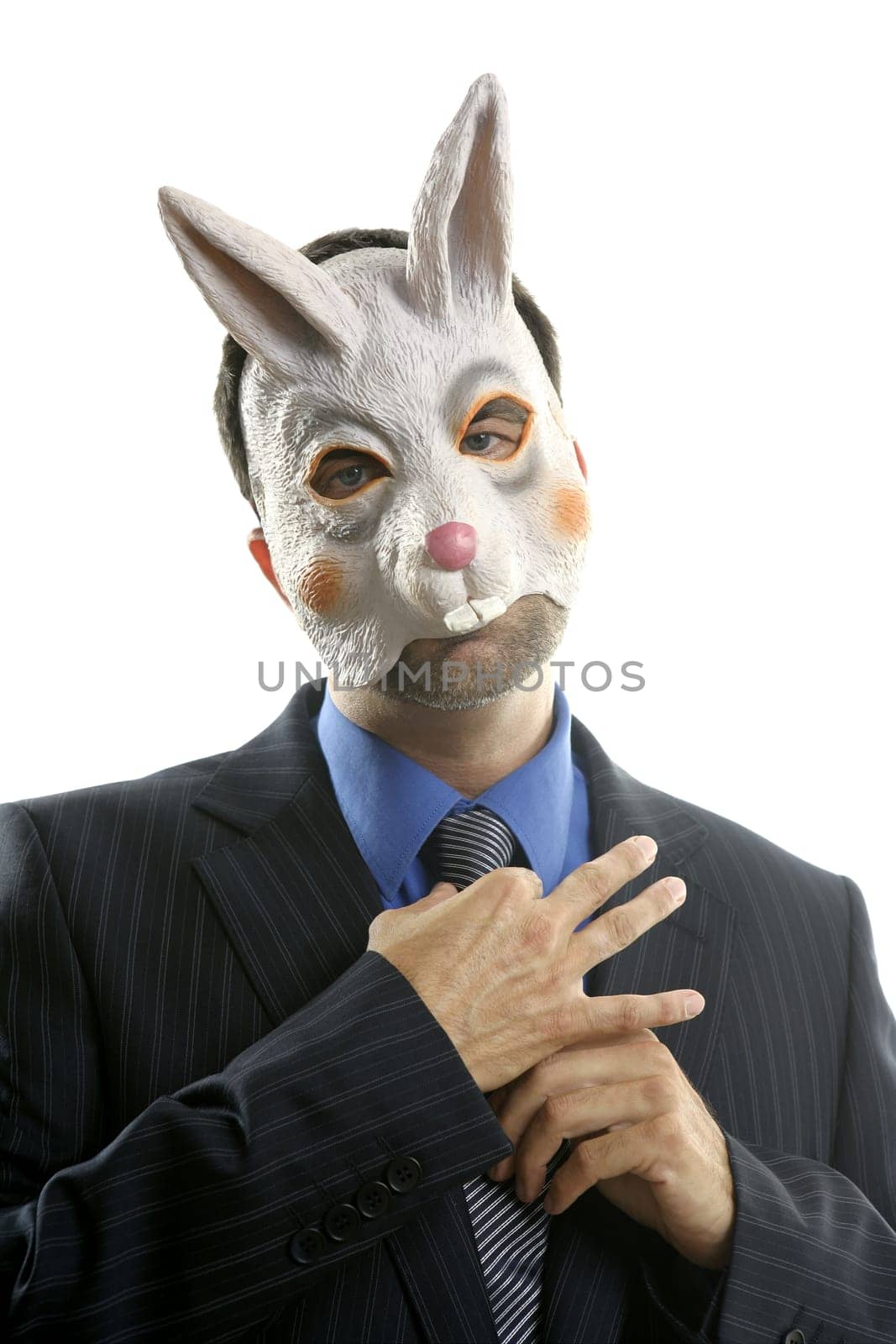 Businessman with funny rabbit mask over white studio background