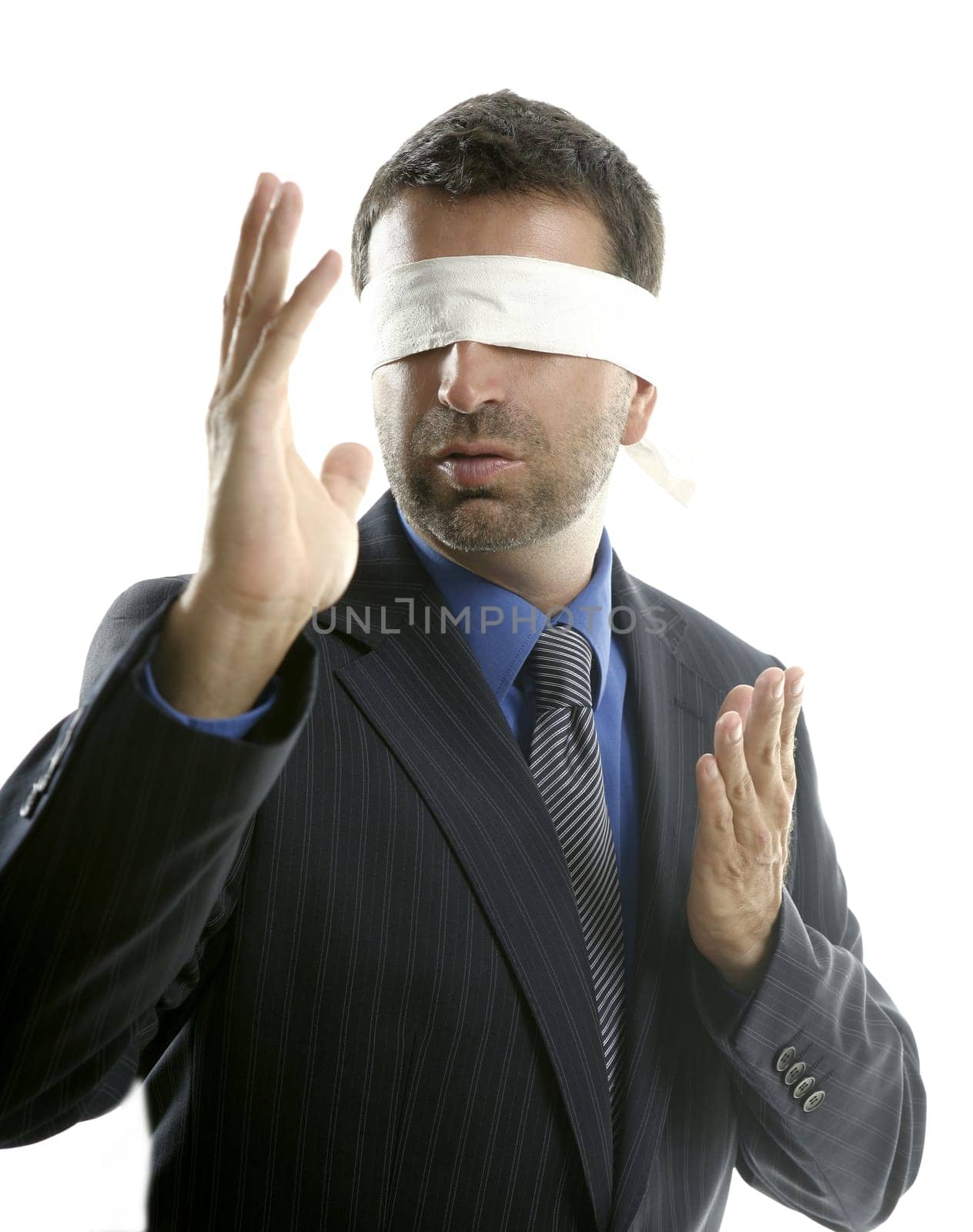 Blindfolded businessman over white background, defense martial arts