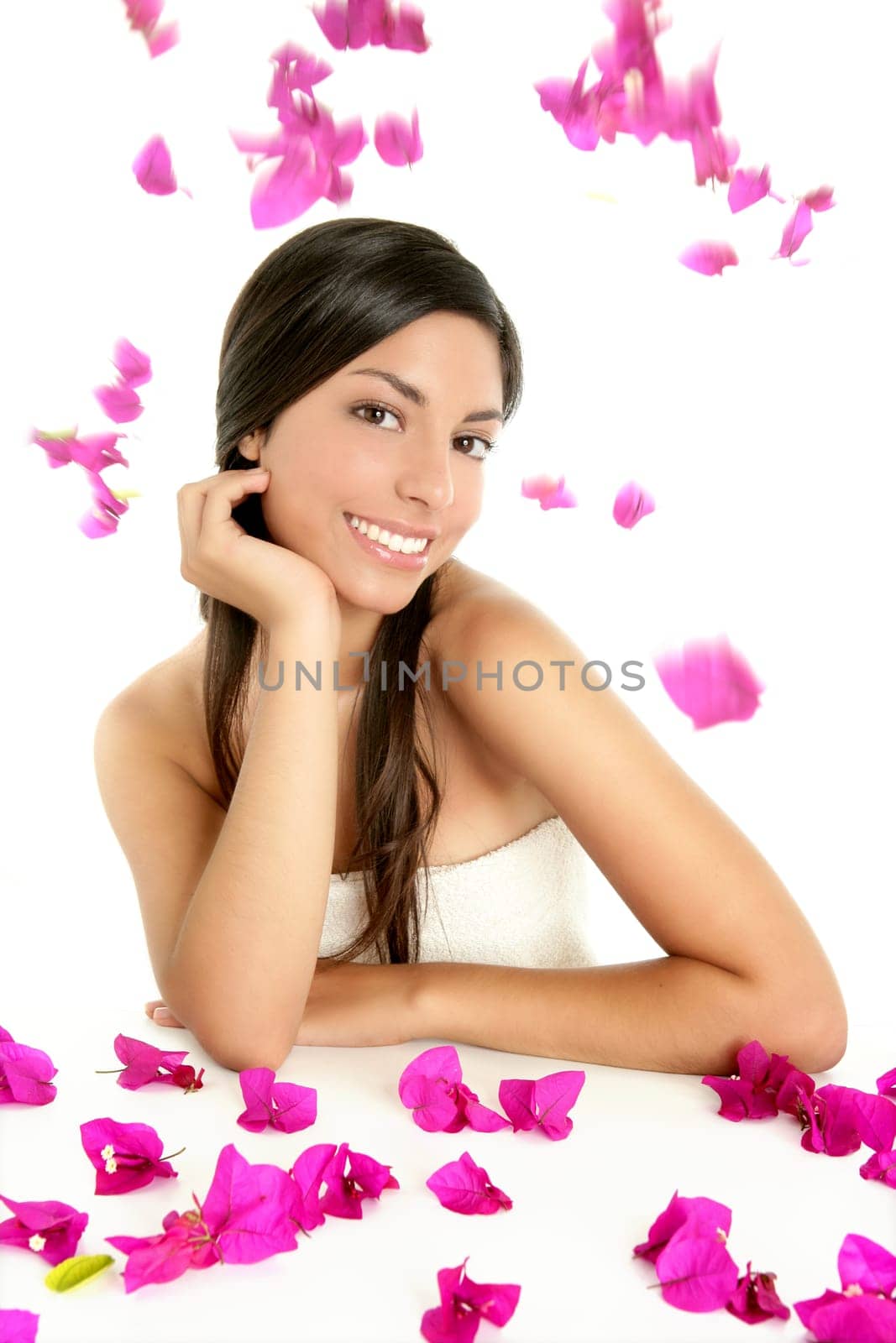 Beautiful indian woman portrait with bougainvilleas flowers over white