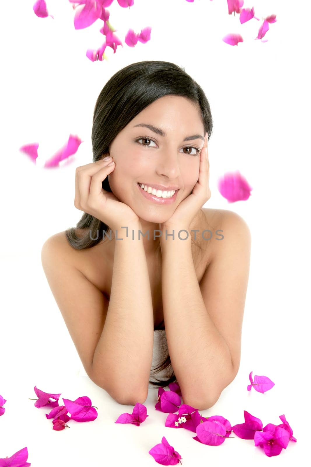 Beautiful indian woman portrait with boungainvilleas flowers over white