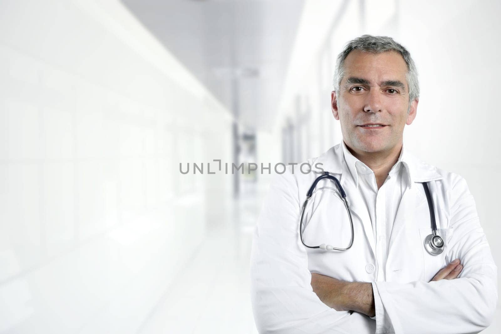 gray hair expertise handsome senior doctor hospital portrait white corridor