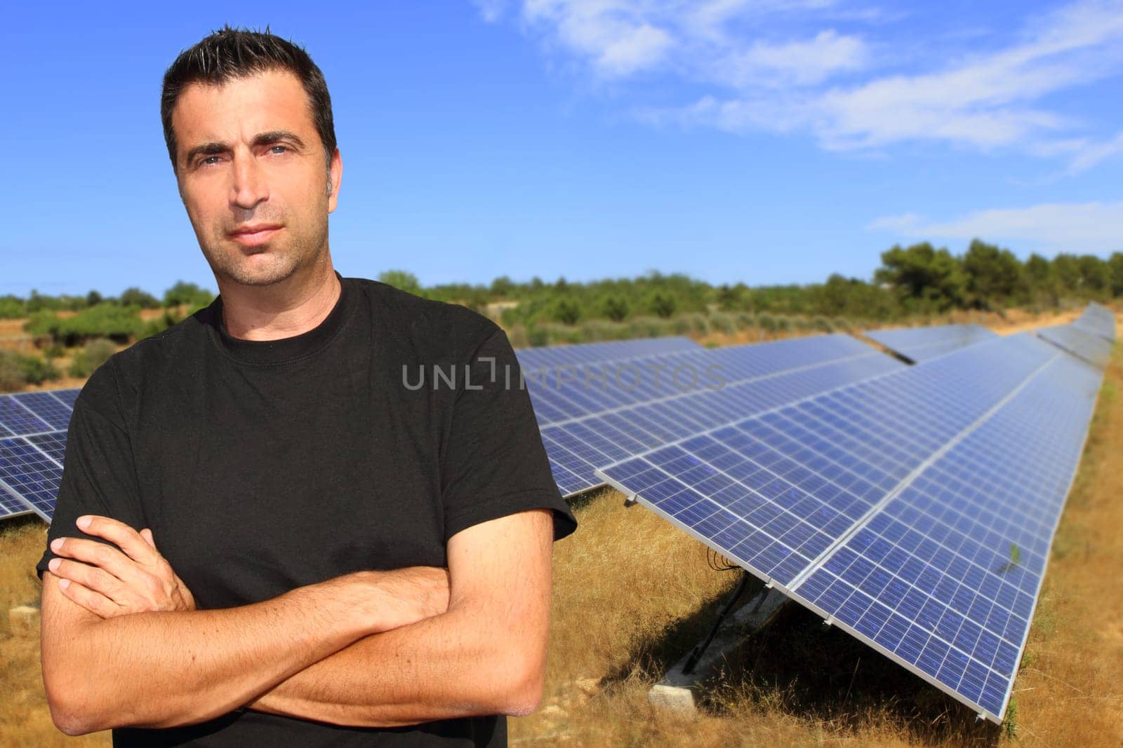 Green electric energy solar plates man portrait ecology